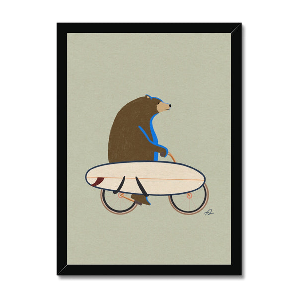 Grizzly riding a bike with a surfboard Framed Print