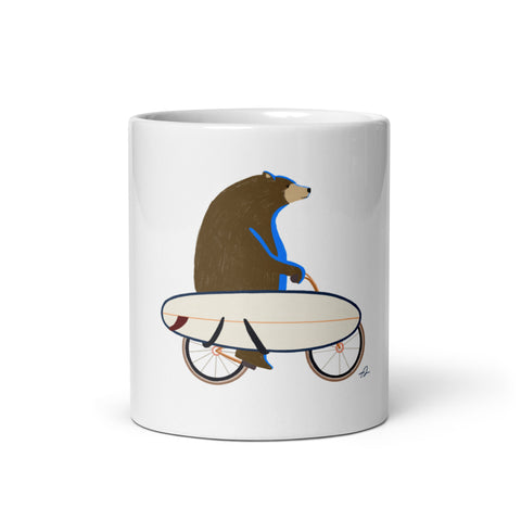 A grizzly riding a bike mug